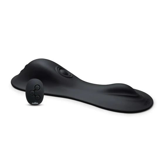 Cowgirl Rodeo Rumbler ride-on sex machine in black silicone, shown with its wireless remote