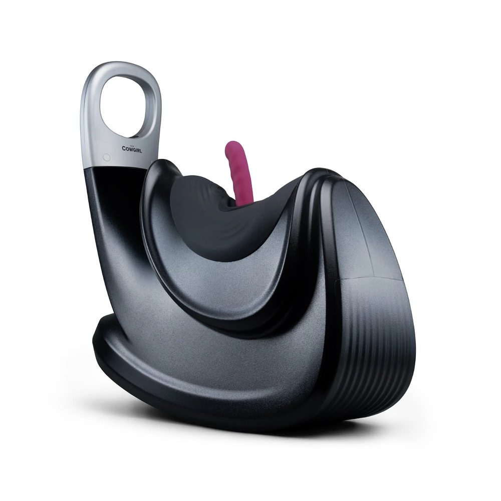 The Cowgirl Thrust Rider ride-on machine in black with a carry handle and ribbed body