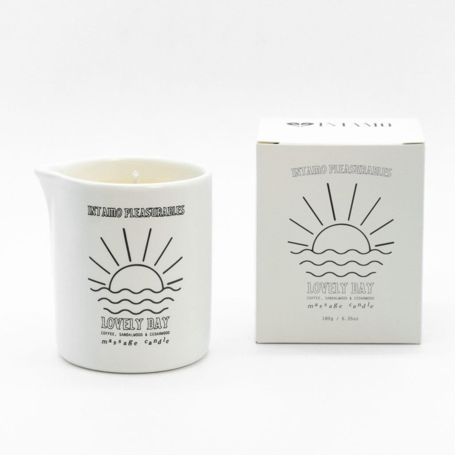Lovely Day massage candle in coffee, sandalwood and cedar, with its box