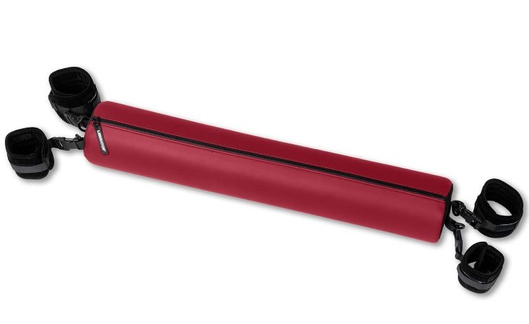 Padded claret faux-leather spreader bar with cuff connector points at each end and two attached wrist cuffs