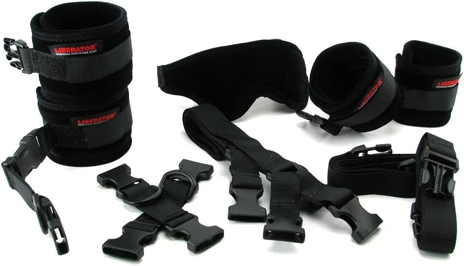 Black nylon tether and cuff restraint kit with adjustable straps and Velcro cuffs, shown laid out flat